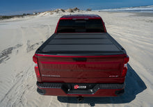 Load image into Gallery viewer, BAK 14-18 Chevy Silverado 1500 / 15-20 Silverado 2500/3500 5ft 8in Bed BAKFlip MX4 Matte Finish