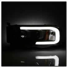 Load image into Gallery viewer, Spyder 02-05 Dodge Ram 1500 Light Bar Projector Headlights - Black (PRO-YD-DR02V2-LB-BK)