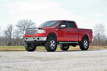 Load image into Gallery viewer, ford-lift-kit_576n2-install-red.jpg