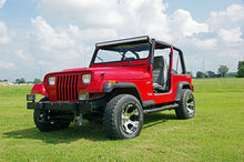 Load image into Gallery viewer, lights-50-inch-jeep-yj-mounts_70508-installed-2.jpg